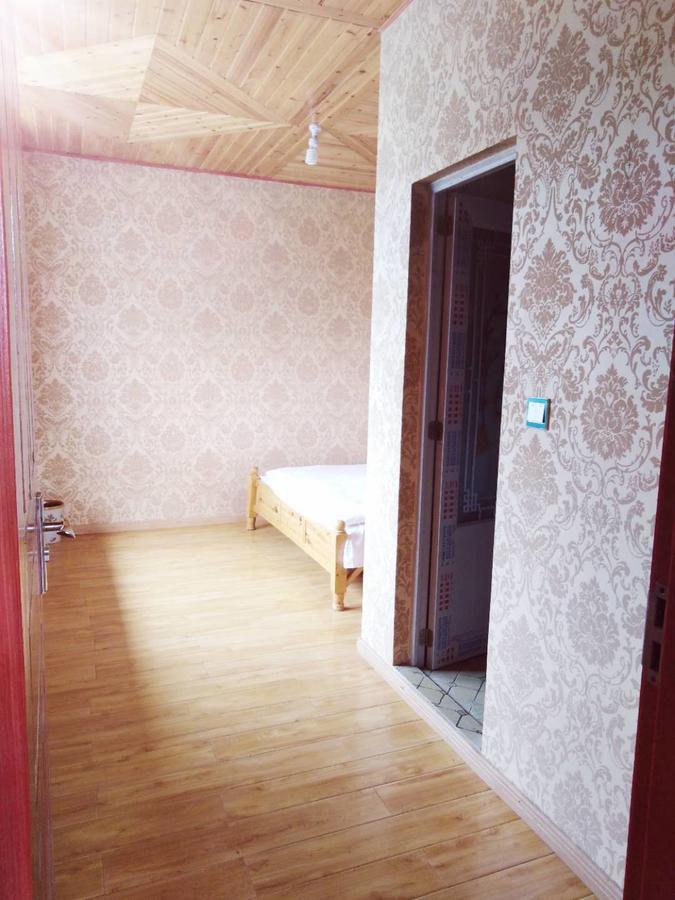 Zishuo Zihua Guest House Daocheng Zewnętrze zdjęcie